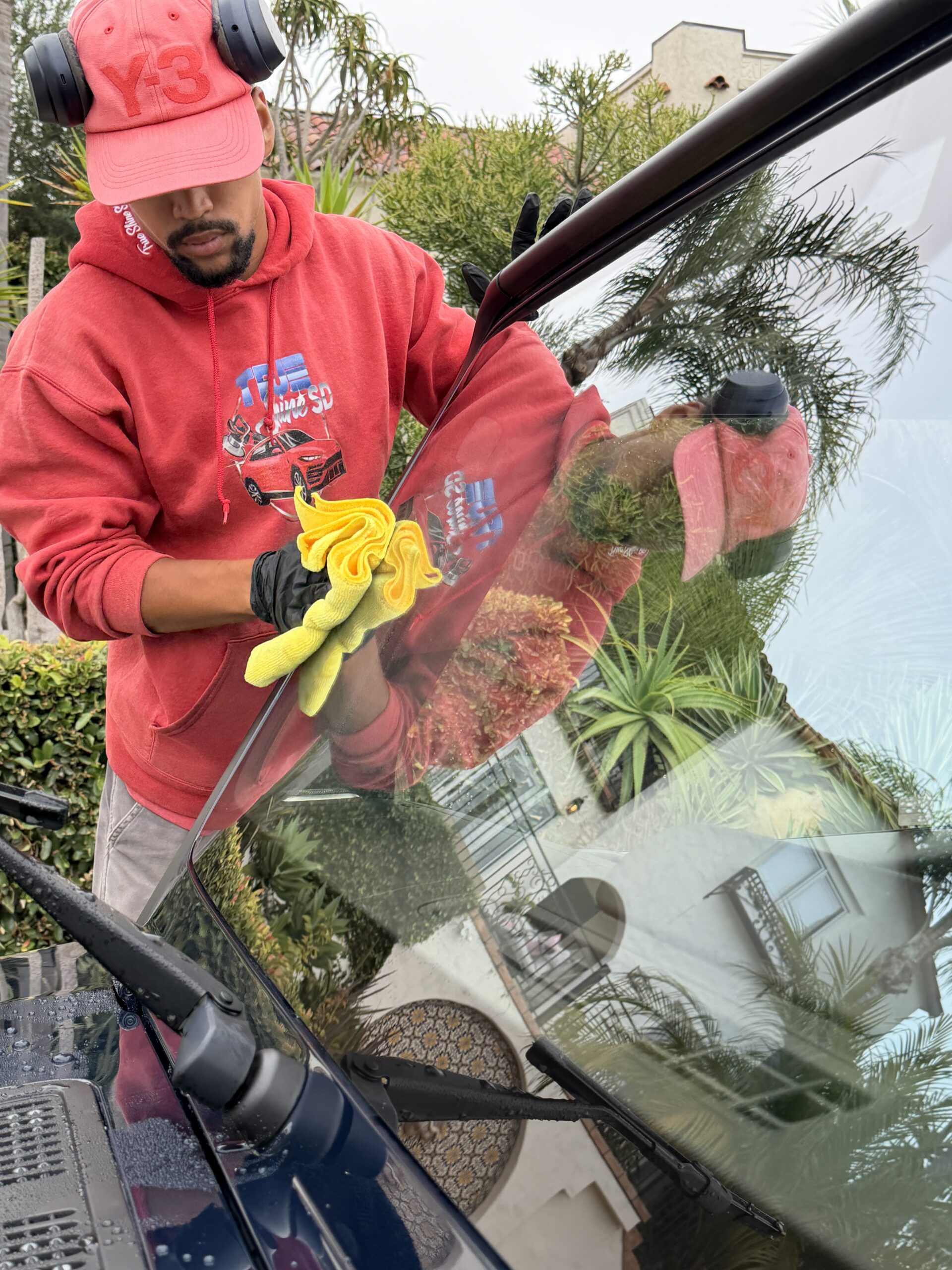 team member getting streak free glass